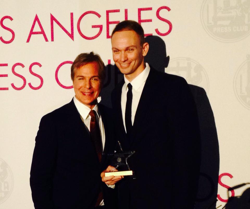 Receiving the "Journalist of the Year" award from  LA Press Club President Robert Kovacik.